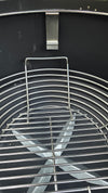 Close-up of Kick Ash Basket handle of the KAB-BKT-C1912 inside the Spider Huntsman Grill.